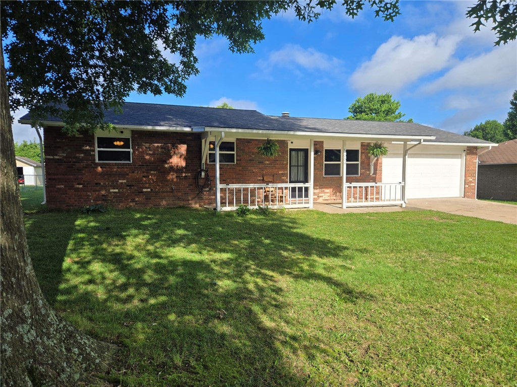Completely remodelded home sitting on a huge .68 acre lot with no homes behind for privacy at night and on weekends. Swing open your new front door and you will enjoy the fresh paint throughout the home as well relish in the new hard surface LVP flooring in every room. The living room is perfect for family night watching a movie or enjoying a fun board game. Kitchen features plenty of butcher block countertops and lots of storage for everything your family needs. The laundry room is off kitchen with plenty of room to add shelves for a pantry. All 3 rooms are gigantic and allow for plenty of room to sprawl out. The primary bedroom has an ensuite while other two would make use of the seond bathroom. Out back you can relax under the 40 foot covered back deck and let the kids play football in the enormous backyard. Stor all your lawn equipment in one of two storage shedswith one being big enough to be a tinkering shop. This allows the garage to hold both your cars. Call today before this is gone!