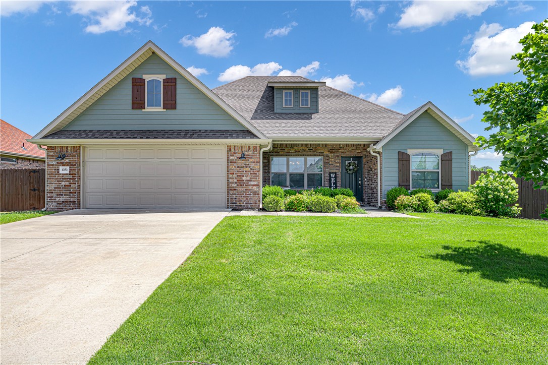 Welcome to South Pointe! Built in 2020 and still feeling brand new, this 3 bed, 2 bath home has 1,856 sq ft with a split floor plan that gives everyone their own space, plus a home office for those work-from-home days. The kitchen is the kind you don't want to leave — granite counters, tons of cabinet space, and a real pantry. It opens right into the living room, where a gas fireplace makes it feel cozy without even trying. The primary suite is tucked away for privacy, and the other two bedrooms are great for kids or guests. Floors are a mix of luxury vinyl plank, tile, and carpet. Out back is a covered porch overlooking a quarter-acre lot, perfect for morning coffee or evening hangouts. Plus a 2-car garage and a brand-new 2025 roof, so that's one less thing to worry about. You're also just minutes from the community pool and playground. This move-in-ready gem won't last long!