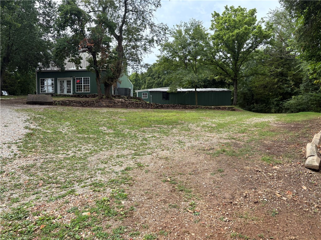 Currently Nationwide Softspas, Inc , manufacturing Soft Spas. Has office area with upstairs apartment and manufacturing and shipping area with dock that was built in 2023. Excellent location for any type business. Latest traffic count 8,400 cars per day