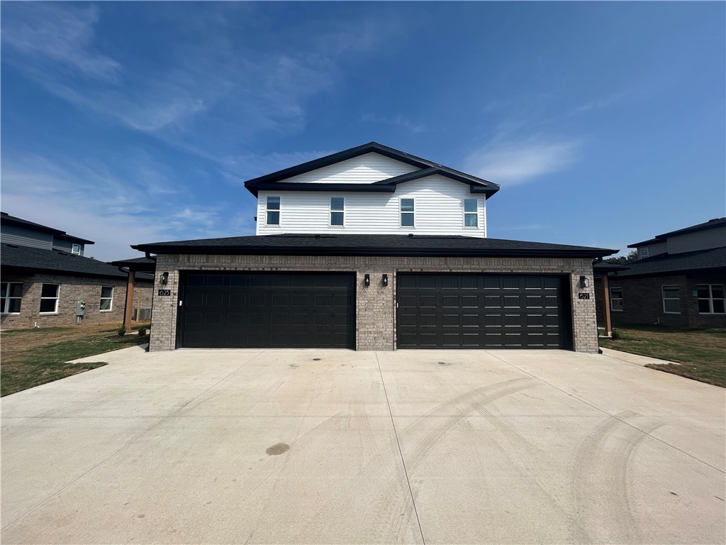 Comfortable 3-bedroom, 2-bath home featuring an open kitchen and living room area — perfect for gatherings.