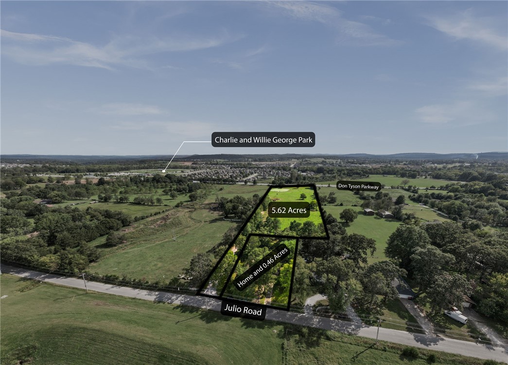 Phenomenal development opportunity right in the middle of the hustle & bustle of growing Springdale. Two parcels, totalling 6.08 acres, with over 216' of frontage on the heavily travelled Don Tyson Parkway. These flat parcels are ideal for future developments like SFR and multi-family. Nestled among all of the amenities in Springdale-- walking distance to multiple schools, 2 mins from the bustling DTP/HWY 71B intersection, and less than 5 minutes to the Razorback Greenway. The smaller parcel includes a 2,194 sf. single family home in good shape-- which could make an ideal rental or alternate entrance to the large parcel. The larger parcel is 5.62 flat acres with partial pond access and access to Julio Rd. Sewer, water & gas on site. Both parcels to be sold simultaneously together. Cross listed with MLS #1324095