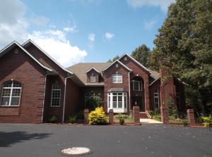 Stately Executive Home! One of a kind! 4 bedroom 3.5 bath home is very spacious! Home has a walk in gun safe. Home also features a 100 yard indoor shooting range!  This home is a must see!