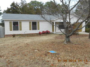 NEW NEW NEW!!! It doesn't get much better than this! Almost everything has been replaced! All New laminate flooring throughout the home, New quartz counters in kitchen and baths, New Stone backsplash, All New sinks in Bathrooms & Kitchen, New bathroom mirrors, New faucets, All New interior paint on walls, trim & doors, New fans, New fixtures, New deck, new door knobs, & All New Stainless Appliances (except fridge)!!! I even had the kitchen cabinets glazed! This is almost a new home now and sits on a Large fenced .70 acre yard across the street from one of Russellville's finest subdivisions! Please note that The side lot extends past the fenced in area all the way to the woods!! If your looking for a great affordable home in a wonderful area then you found it! (AGENT OWNED!!)