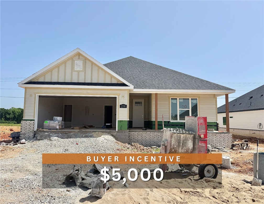 $5,000 BUYER INCENTIVE. Fence, blinds and gutters included! Discover your dream home in the new neighborhood- Jacob's Crossing. Fredrick plan with 1 level, garage on the left & North facing! 10 ft ceilings in the living room, linear electric fireplace, LVP flooring throughout the main living areas & primary bedroom, quartz countertops & more. Chef's kitchen boasting frigidaire stainless steel appliances, gas range, pantry, quartz countertops, bar pull handles, large island & gorgeous backsplash. Upgraded island paint color will be Mindful Gray! Luxurious primary bedroom features abundant natural light, while the spa-like primary bathroom offers a walk-in shower, double sinks, tub & spacious walk-in closets. Additional features include three large secondary bedrooms and a separate laundry room. Nestled on a generous lot with covered patio that overlooks the serene sodded, fully fenced backyard, creating an exceptional living experience. Model home located at 3631 Tranquility St-Lot 1.