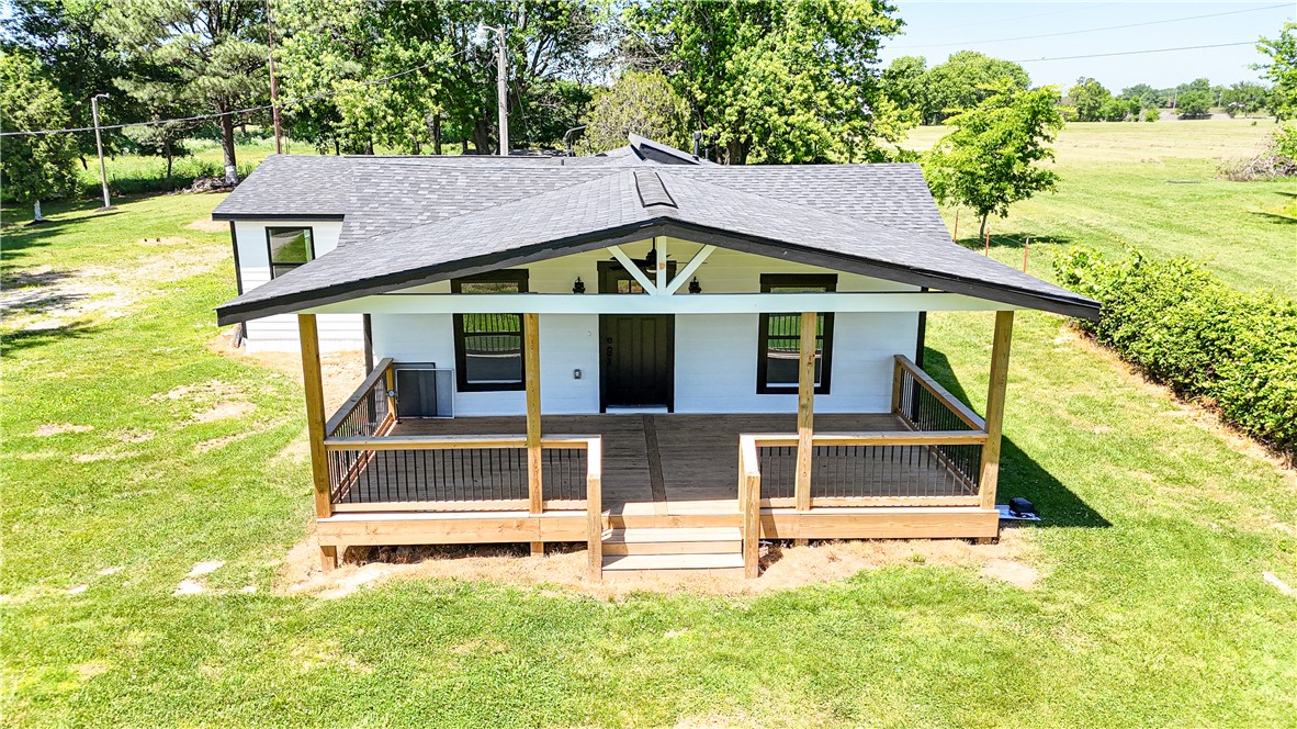 Completely remodeled, like new 4 bedrooms 2 full bathrooms, granite counter tops, storm shelter, 1 acre lot.