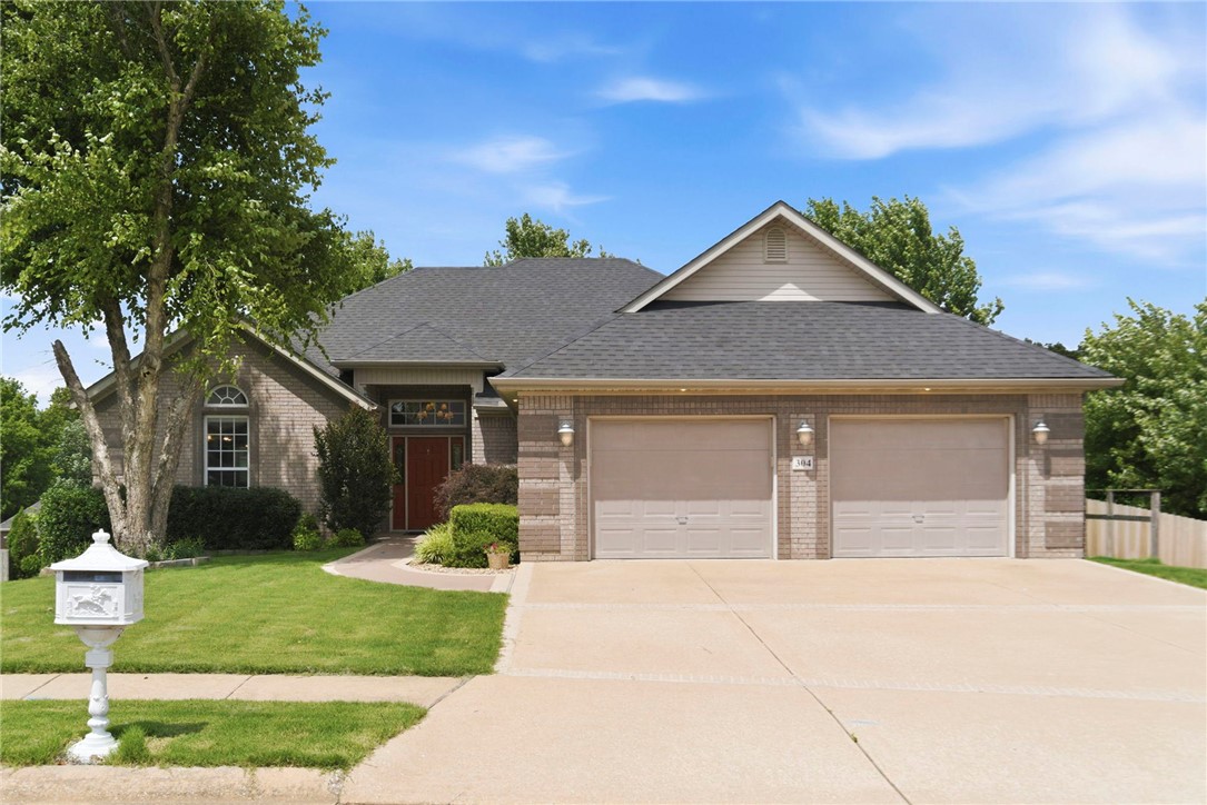 Location, lifestyle, & adventure come together at 304 SW Duke Ave in the heart of Bentonville! Just minutes from Downtown Bentonville, Coler Mountain Bike Preserve & the new 100-acre bike park, this home offers unmatched access to the best of NWA. Inside, you'll find hardwood floors, soaring 10-foot ceilings, crown molding throughout, & a stunning designer ceiling in the living room. The spacious kitchen is built for entertaining with a large island, dual convection ovens, food warmer, abundant cabinetry & JennAir cooktop. The expansive back deck spans the entire width of the home, creating a treehouse-like retreat where you can relax among the mature trees, enjoy peaceful wooded views, and experience a rare sense of privacy. The primary suite features a spa-like bath with a sunken Jacuzzi tub, separate shower, and generous space to unwind. Luxury, comfort, and an unbeatable Bentonville location all come together in this exceptional home, offering the perfect blend of convenience, recreation, and everyday living.