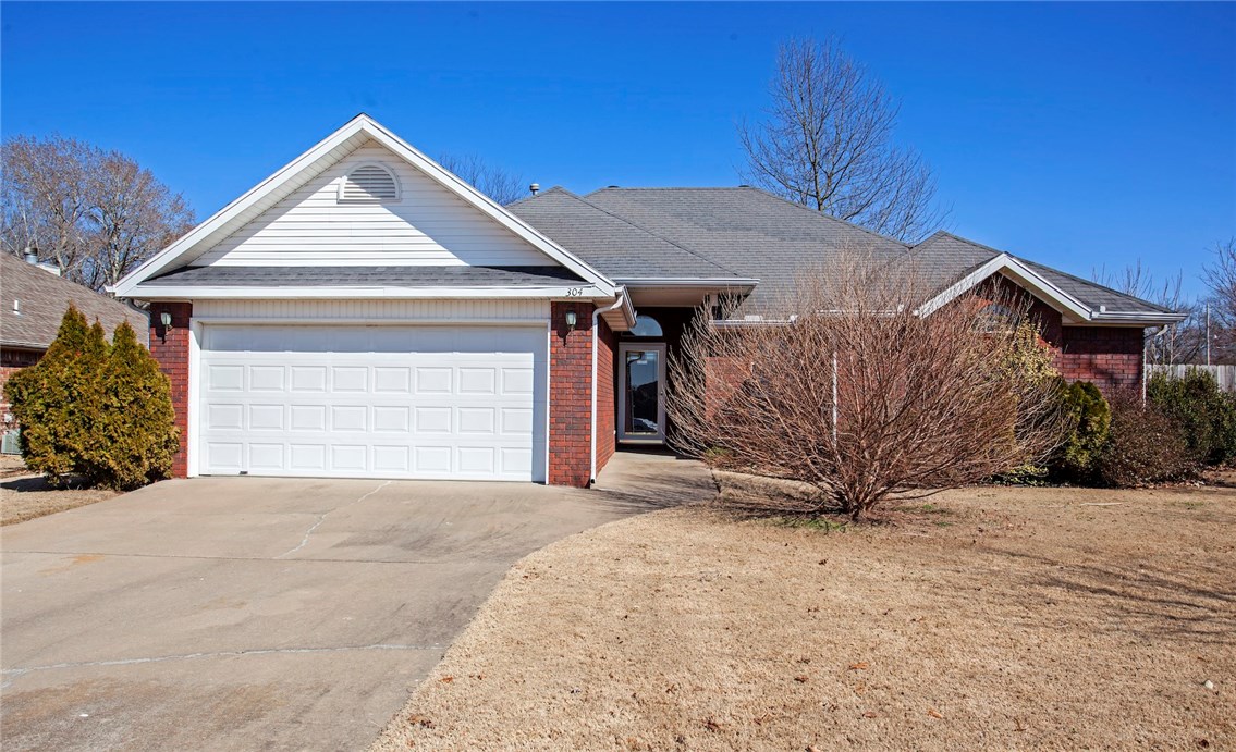 Great 3 bedroom 2 bath home just west of Walton Blvd. This home has beautiful hardwood flooring thru main living area, Fresh paint, wood burning fire place in living room and includes washer/dryer and refrigerator. Privacy fenced back yard has storage/work shop building, separate garden area and beautiful landscaping.