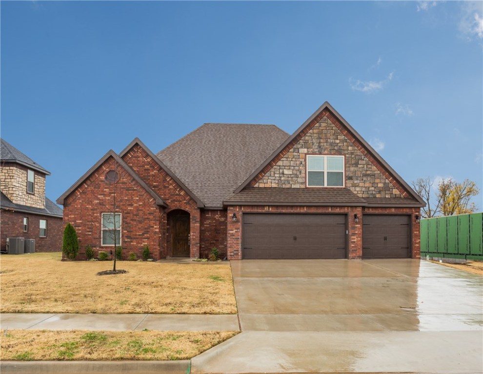 New construction by RLP Investments in walking distance to schools. Home features include granite counters, custom cabinets, security system, landscaped front, covered balcony, 3 car garage, pantry storage, a jetted tub, and a tile walk in shower.