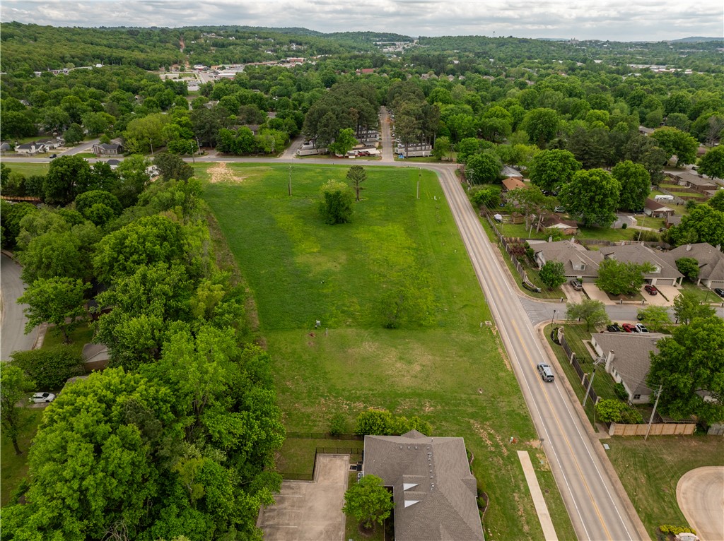 Located between College Ave and Greg Ave and just south of Washington Regional Medical Center, this .49 property is zoned R-O Residential-Office. Great retail, medical, or office space location. Residential Office District is designed primarily to provide area for offices without limitation to the nature or size of the office, together with community facilities, restaurants and compatible residential uses. The intent of this district is to allow administrative approval if the developer decides to use urban form, in compliance with the build-to zone and minimum buildable street frontage.