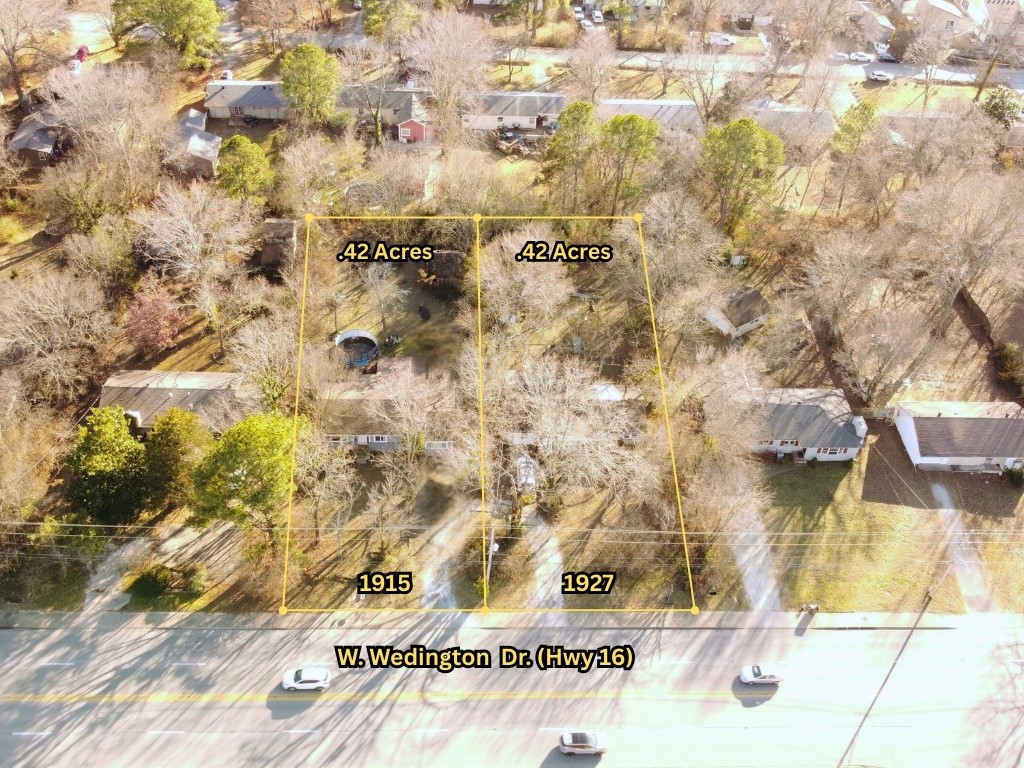 LOTS of OPPORTUNITY!!! Purchase these two amazing properties as one to use as rental properties or use as a potential development opportunity for a whole new chapter for this perfectly located property near U of A and many of the amazing things available in NWA. U of A bus stop is across the street. Beautiful original hardwood floors. Huge backyards on both properties. Both homes are currently occupied. Small section of rear roof on 1927 has damage and is currently patched and tarped and is not leaking. Both homes have updated insulated windows. Currently zoned as RSF4, but several properties in the area have been rezoned for multifamily/ infill.