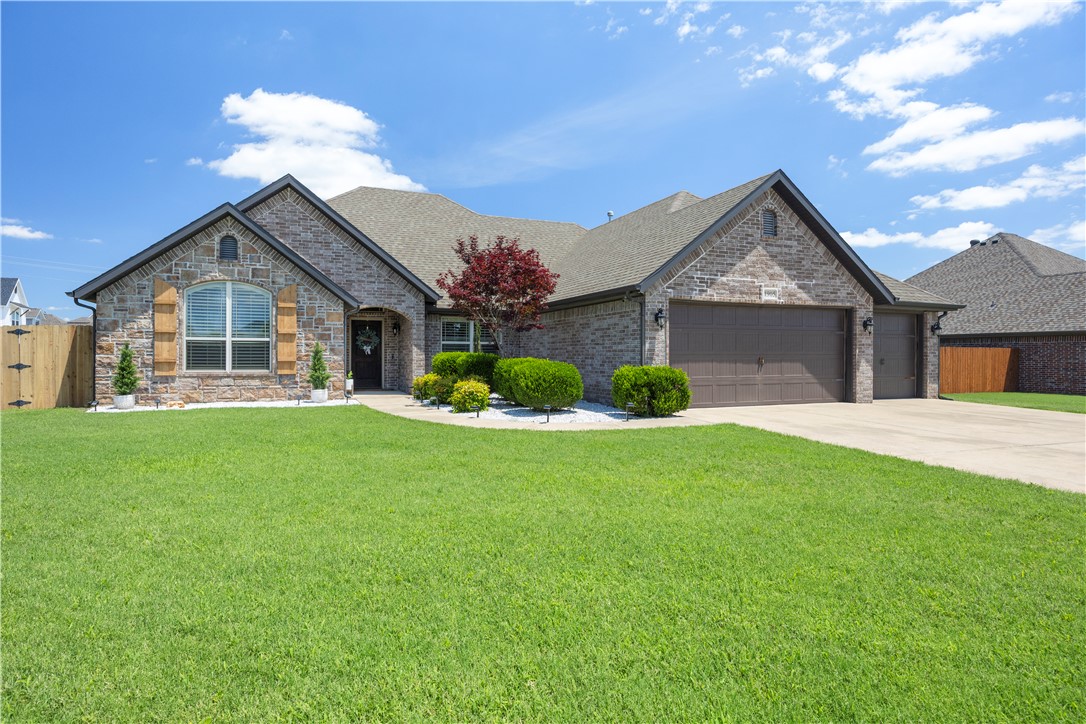 Agent Owned. Prime Location in NWA that feels like home the moment you walk in. This 4-bedroom, 2-bath residence offers 2,305 square feet and a 3-car garage on a spacious 0.32-acre lot with a backyard that’s hard to find in this sought-after area.

Fresh paint, a split floor plan, granite countertops, plantation shutters, and crown molding create a warm, welcoming feel perfect for everyday living and gathering. Designed for flexibility, the home includes a dining room currently used as a playroom that can easily become a formal dining space, home office, or second living area. The living room features a cozy fireplace converted to electric for convenience and ambiance, with the option to convert back to gas. Outside, the covered patio and wood-burning fireplace are ideal for relaxing and entertaining.

Enjoy quick access to Rogers, Bentonville, Springdale, and Fayetteville via I-49 or local routes. From Pinnacle Hills and Topgolf to the Walmart AMP, trails, dining, and shopping, everything is minutes away.