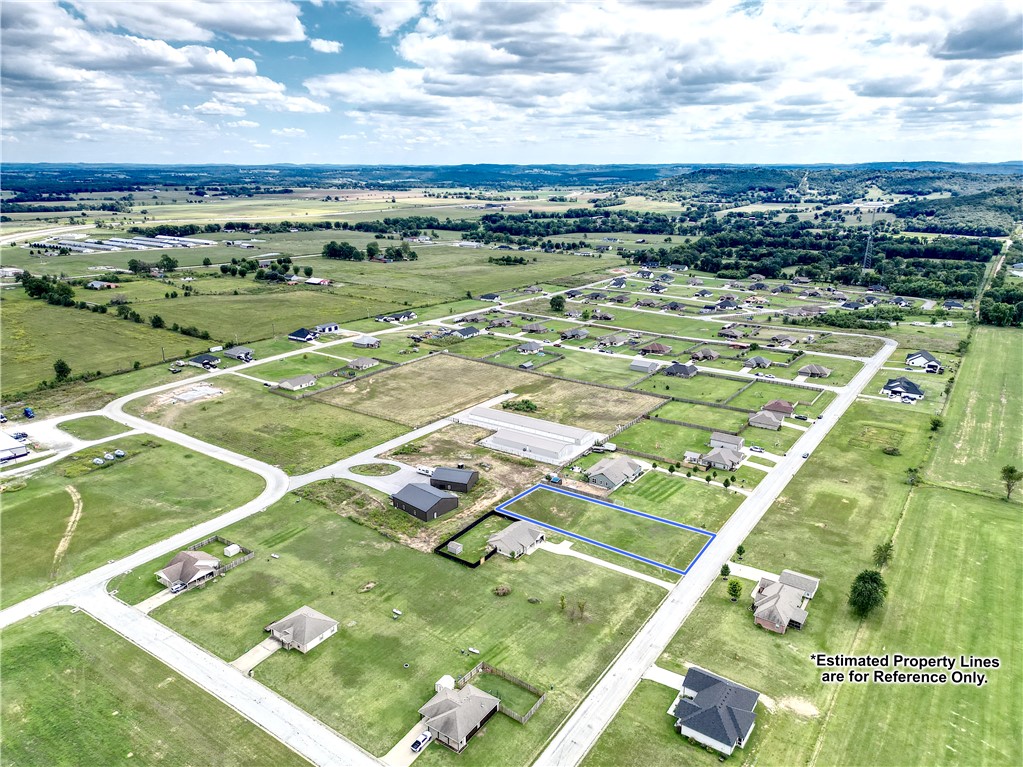 Build your dream home on this beautiful .53-acre lot, located in an established neighborhood with nice homes on oversized lots. Enjoy the peace and privacy of being outside city limits, while still just a 15-20 minute drive from Springdale. This spacious property has access to water and electricity-making it ready for your custom build in a truly desirable setting.  Don't miss out.  Call today to schedule a private showing.