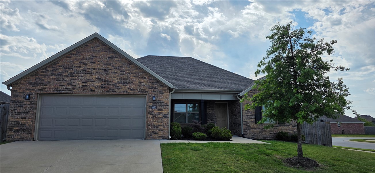 Beautiful home located in the Hickory Meadows Subdivision in Tontitown and sits on a corner lot. Great, open split-floor plan with lots of crown molding. The formal dining has hard wood flooring and is open to the living room. There are granite counters in the kitchen along with stainless appliances, an eat-in area and a pantry. The primary bedroom suite has a separate jetted tub and shower, large walk-in-closet and dual sinks. A large utility room is located off the garage. The backyard has a great covered patio area and a privacy fence.