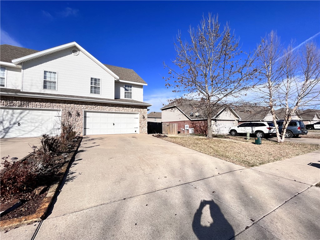 This 3 bed, 2.5 bath duplex features a bright living space, full kitchen appliances, a spacious primary bedroom, and extra backyard storage shed and fully fenced—all close to everything Bentonville has to offer.