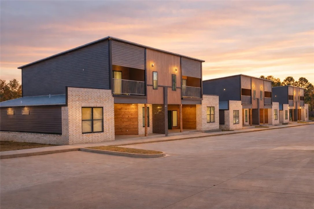 University Park Place is a 48-unit, purpose-built student housing community strategically located within a 2-minute walk to the University of Arkansas–Fort Smith campus. Fully furnished 4-bedroom, 4-bathroom townhomes with individual, by-the-bed leasing, catering directly to student renters. Each unit offers modern, highly desirable amenities including private bedrooms and bathrooms, stainless steel appliances, wood-style flooring, in-unit washer and dryer sets (two per unit), walk-in closets, and fully furnished living spaces with large-screen TVs. Community features are outdoor grilling areas, fire pit pergolas, pet-friendly spaces, and planned resident events, enhancing tenant retention and lifestyle appeal. The asset is positioned as one of the most affordable off-campus housing options in the market while maintaining strong unit quality and competitive amenities.