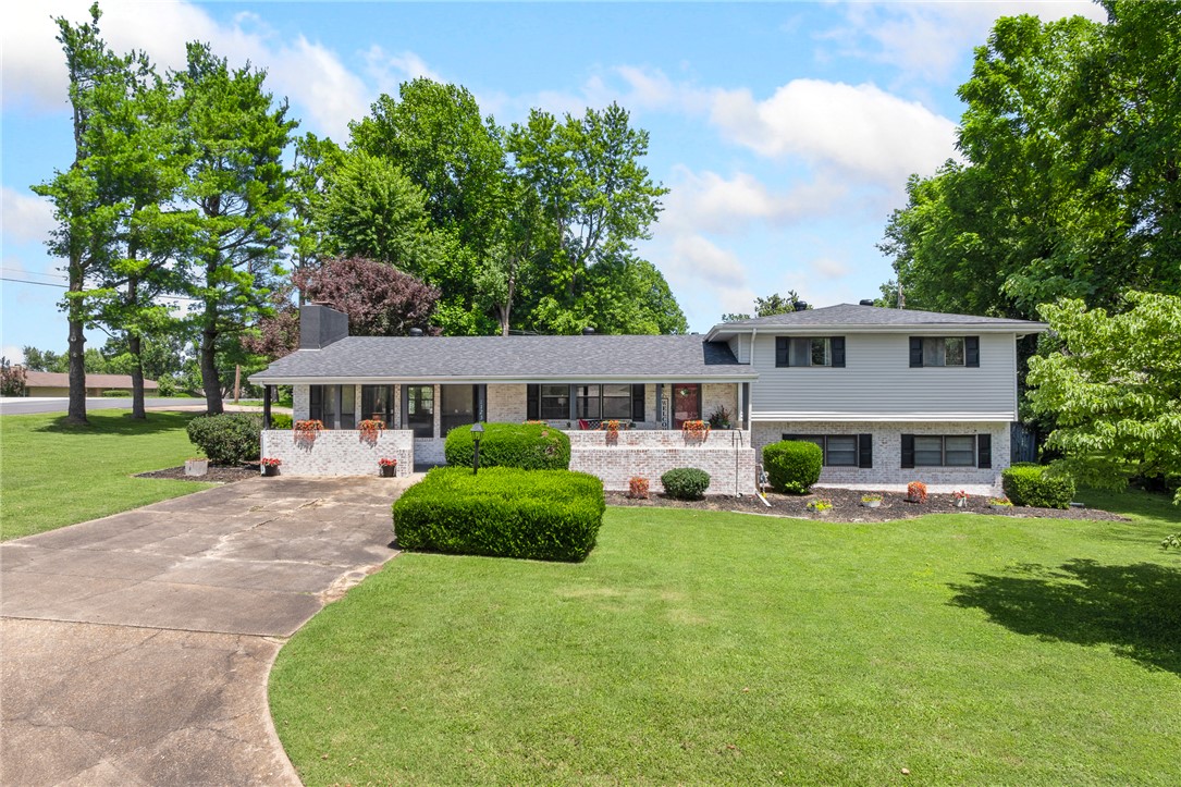 Welcome home to this spacious 4-bedroom, 2-bath residence offering over 3,300 square feet of comfortable living space in an established neighborhood. Inside, you'll find generous room sizes, multiple living areas, and a versatile floor plan designed for both everyday living and entertaining.  The heart of the home flows effortlessly into a beautiful oversized sunroom filled with natural light, perfect for morning coffee, relaxing with a good book, hosting family gatherings, or simply enjoying natural light year-round.  Each bedroom offers plenty of space, while the home's thoughtful layout provides flexibility for growing families, guests, a home office or game room. Looking for room to spread out or space to bring everyone together, this home delivers.  Conveniently located near schools, shopping, dining, and everyday amenities, this property combines space, comfort, and convenience in one package. If you've been searching for a home with room to live, entertain, and make lasting memories, this one is a must-see!