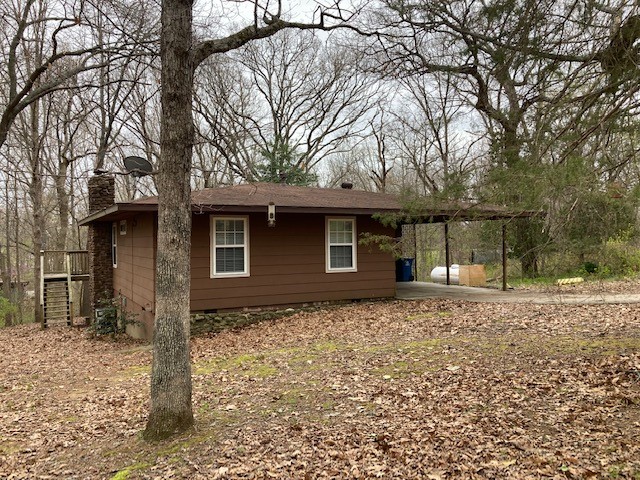 Neat and clean remodeled older home.  Vinyl wood look flooring throughout, Includes newer electric range, dishwasher and microwave. Wood-burning insert fireplace,  Large deck, sun room. Carport.