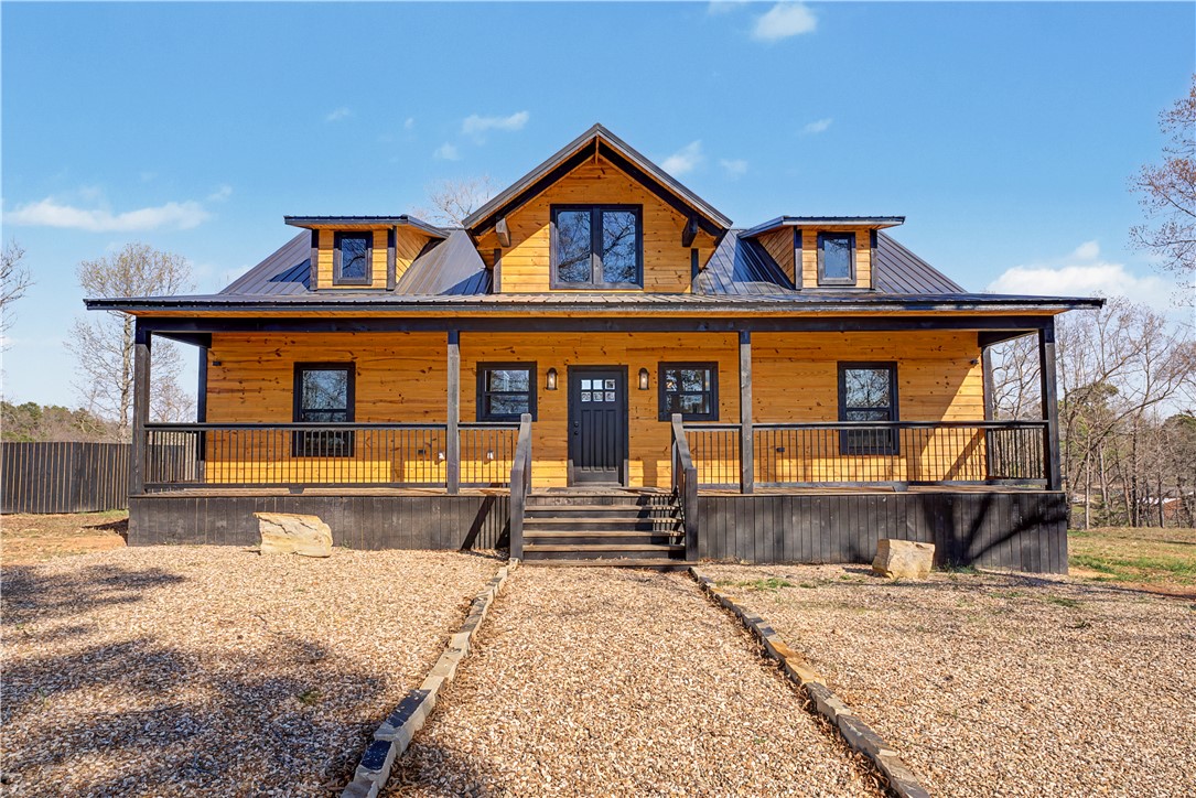 "$3,500 preferred lender credit** Welcome to your perfect Ozark getaway! This brand-new construction 3-bedroom, 2-bath mountain home is
nestled just 4 miles from the Jasper town square, offering the ideal balance of peaceful seclusion and convenient
access to local adventures.
Step inside to a warm and inviting interior featuring rustic cabin-style finishes, modern comforts, and an open-concept layout designed for relaxing and reconnecting. Whether you’re searching for a full-time residence, a luxury vacation retreat, or an income-producing property, this home checks every box.
Start your mornings on the deck taking in scenic mountain views and wind down your evenings around the firepit with Adirondack chairs—perfect for enjoying fresh Ozark air and star-filled skies.
Ideally located in the heart of Newton County, you’re just minutes from shopping, dining, hiking, biking,
camping, floating the Buffalo National River, zip-lining, rock climbing, and more. Adventure, comfort, and serenity all come together here.