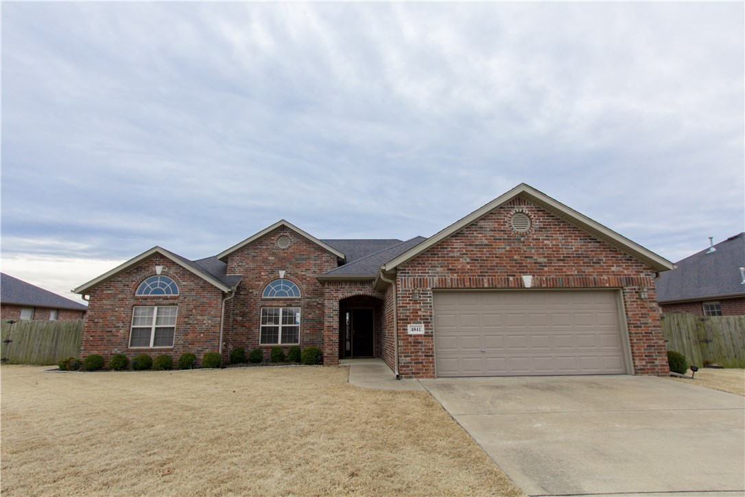 Come see this beautiful 4 bedroom 2 bath home in Persimmon Place Subdivision. Just minutes away from schools, restaurants, entertainment, and I-49. Very well maintained split floor plan in highly coveted West Fayetteville. Elegant crown molding frame this spacious living room's gas log fireplace.  Master bedroom features his and hers walk in closets, double vanities, and a jetted tub. Kitchen has all the amenities including granite counters, stainless appliances and pantry. Brand New Carpet in Bedrooms! Huge backyard great for summer gatherings. Nice quiet neighborhood.