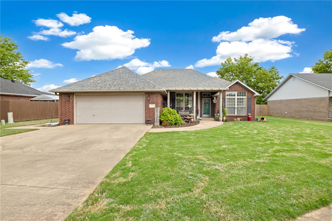 Turnkey home w/ all appliances included PLUS a one-year home warranty nestled in an established neighborhood on a large 1/3 Acre +/- lot. The curb appeal of this all-brick home truly shines! Grand front porch w/pergola-style trim, mature landscaping, shade trees & a Bermuda lawn. The backyard is designed for relaxation & functionality complete w/a covered porch, privacy fencing, storage building & a dedicated meditation/prayer garden. Inside, you'll find wood & tile flooring, tall ceilings, crown molding & abundant natural light. The split floor plan provides privacy w/ the primary suite featuring a large bathroom & walk-in closet on one side, & 2 additional bedrooms w/a full bath on the other. The dining area sits in an alcove, offering space for a home office or additional living. Practical features incl a gas range, gas log fireplace, & gas water heater, valuable amenities during power outages.