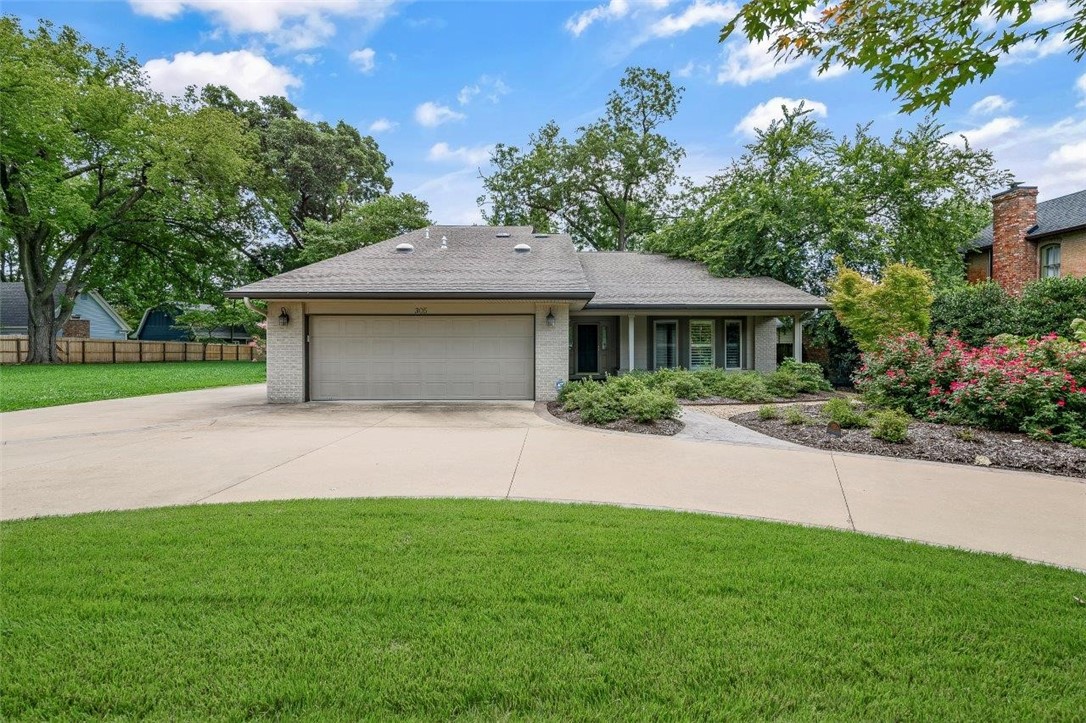 You cannot beat this location of this home! Only feet away from the Downtown Bentonville Square! This 3,351 sqft home is ready for you to put your own touches on and make it yours! Front circle drive with charming curb appeal all in the heart of Downtown Bentonville! On the first floor you'll find a spacious formal living room to the right when you walk in with, wet bar and build ins in the open living room with plantation shutters for tons of natural light! Large eat in kitchen with granite countertops and SS appliances. The primary suite includes a large bedroom, a walkthrough closet with tons of space, and bathroom with 2 separate showers! Upstairs there is 2 bedrooms with a full bathroom. Enjoy the serenity of your back yard with plenty of trees and landscaping! Only a minute walk to be in Downtown Bentonville to enjoy all the entertainment, dining and experiences this charming town has to offer.