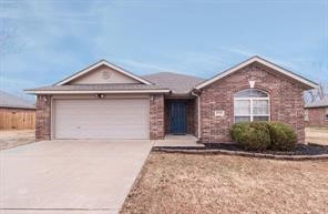 Move-In-Ready Fayetteville Rental: Near Schools, Clabber Creek Trail and I-49! Fenced in yard with a patio. Interior features spacious living room with corner fireplace, kitchen with granite kitchen tops, black appliances including refrigerator and microwave, washer and dryer, owner's bedroom tray ceiling, bath with walk-in shower and dual tile vanity. Laminate flooring in bedrooms, living room and hallways, tile in kitchen, bathrooms and laundry room. Small Pets are ok - Pet deposit applicable. No smoking.