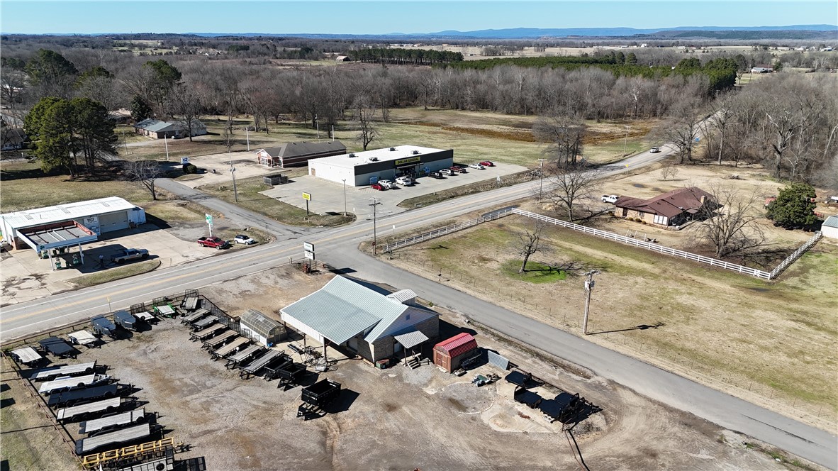 Midwest Land Group is proud to offer Nailed It Feed & Supply in Scranton, Arkansas. Nailed It
provides the surrounding community with plumbing supplies, hardware, livestock feed and medication, and anything farm related. This business is a cornerstone for the community. . Nailed It has large selections of anything from bolts and fasteners to specialty feeds for show animals,pet supplies, and everything in between.

 The store consists of 1900 square feet of up to date concrete flooring, walls,
ceiling, electric and plumbing fixtures. There is an office/break area and restroom. Display shelving occupies the center portion of the store, with additional wall displays and shelves.

The warehouse is 40’x50’  with adjacent loading dock for convenient truck loading and unloading. Inside the warehouse the walls are lined with a pallet rack system for organized storage. There is a 40’ shipping container  and a Hyundai forklift conveys with purchase.