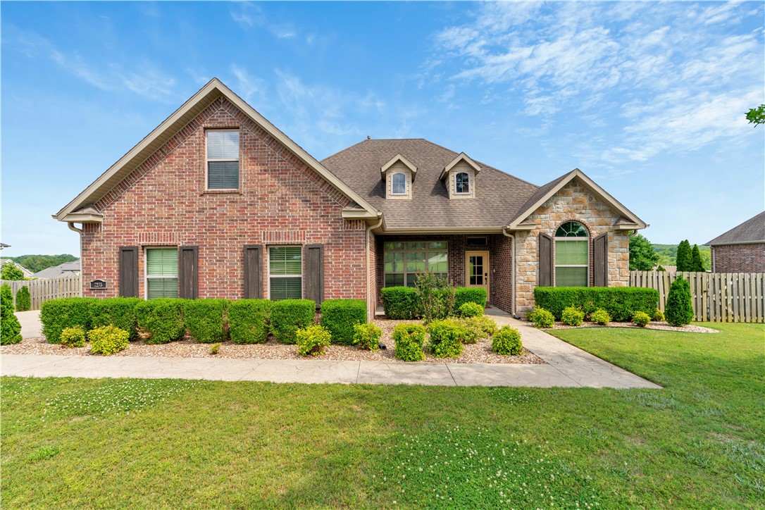 Nestled in the prestigious gated community of Waterford Estates in East Fayetteville, this beautifully designed 4-bedroom, 3-bath home offers 2,545 sq ft of thoughtfully crafted living space situated on an oversized lot of more than half an acre. The functional floor plan features a private upstairs bonus room, ideal for a media space, playroom, or home office. Newly added hardwood flooring in the bedrooms and primary closet adds warmth and elegance, while soaring ceilings, exposed beams, and a fireplace create an inviting atmosphere. The kitchen is built for both everyday living and entertaining with granite surfaces, stainless steel appliances, a gas range with pot filler, and multiple dining spaces. The spacious primary retreat includes a spa-style bath and an oversized walk-in closet. Outdoors, enjoy a covered deck overlooking the expansive fully fenced backyard. A side-entry 3-car garage, community clubhouse, and neighborhood pool to complete the package!