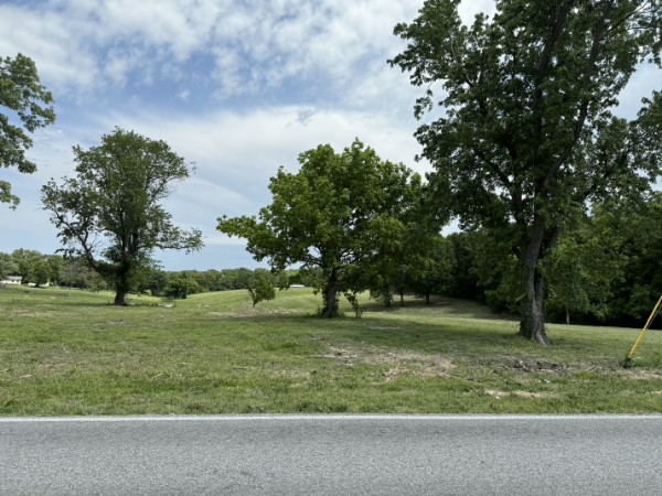 2.5 acres beautiful rolling hills to build your dream home on . Will build to suit. Water in street, Septic needed . No Manufactured homes allowed Survey attached