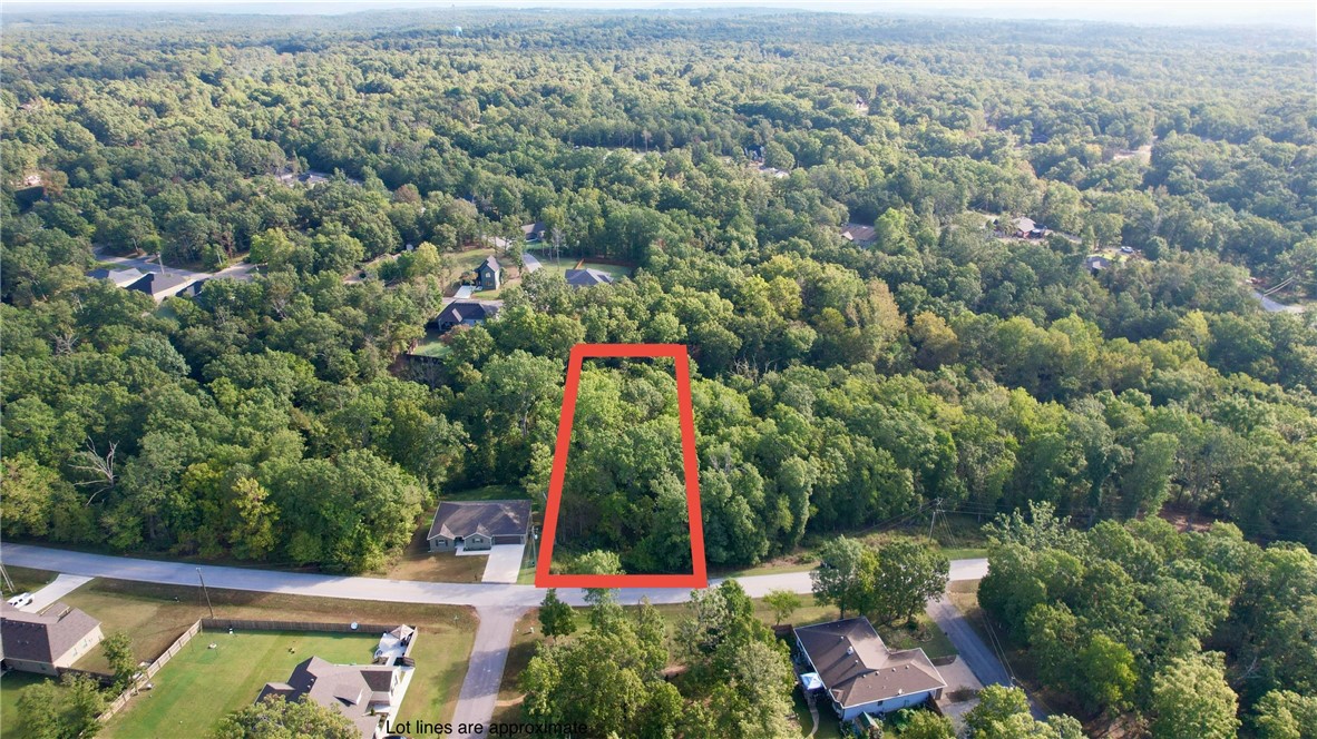 Great LARGE lot for building just minutes from I-49 in Bella Vista that has a perc test for 3 BEDROOMS!  This lot is relatively level at the street and slopes to the back.  Near Highlands Golf Course and Branchwood Recreation Center.