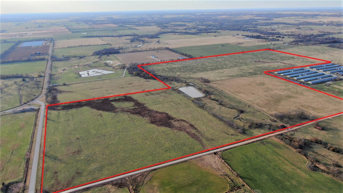 This beautiful level pasture land includes a year round creek and large pond providing year round access to water for cattle or farming. The property includes three parcels #18-16267-000, parcel #18-16306-000, and parcel #18-16321-000. There is 10.05 wooded acres that is located east of the main acreage and is included in parcel #18-16306-000 and included in the total of 173.39 acres. That 10.05 acres does not connect to the other 163.34 acres and is approximately 1 mile east of the 163.34 acres. The land also borders state highway 102 on the south side. Current access to the property is off of Tucker Road. This is prime land for running cattle or farming and is only 10 minutes from Gravette, 30 minutes from Bentonville, and 20 minutes from Siloam Springs. You can enjoy your farm and country living yet only minutes from shopping, restaurants, and recreation. The seller also has an additional 35.32 acres listed across Tucker road which is MLS #1166772. The listing agent is related to the sellers.