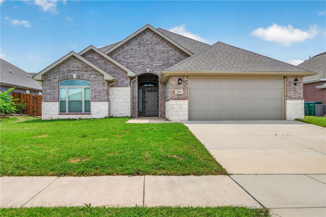 Welcome to this beautifully maintained 4BR, 3BA home in the highly desirable Pines at Orchards Park! From the moment you arrive, the bright and inviting curb appeal makes a lasting impression. Step inside to a wide tiled entryway that opens into a spacious living area, perfect for entertaining and everyday comfort. This thoughtfully designed home features generously sized rooms, expansive dining area windows that fill the space with natural light, and an open-concept layout that creates an airy feel. Cozy up by the electric fireplace or enjoy the charm of the natural brick fireplace, while the gas range adds style and functionality to the kitchen. The primary suite offers a large walk-in closet, double vanities, and a separate soaking tub and shower. Located near schools and less than five minutes from Bentonville West High School, this home also provides quick access to Highway 49 and the new home office campus. Situated in a friendly neighborhood this home combines comfort, convenience, and timeless appeal.