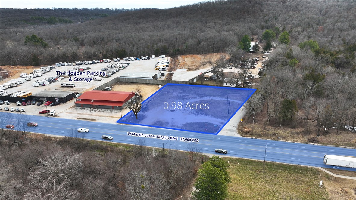 Great development potential on 0.98 acres of commercial land off bustling W Martin Luther King Jr. Blvd in Fayetteville, Arkansas. Situated between nationally recognized retail such as a Walmart Supercenter and Lowe’s. Centennial Park and future middle school campus are within a short drive as well as the University of Arkansas campus and Fayetteville High School. Location provides great convenience to commuters from Farmington and Prairie Grove and is in a direct path of growth.