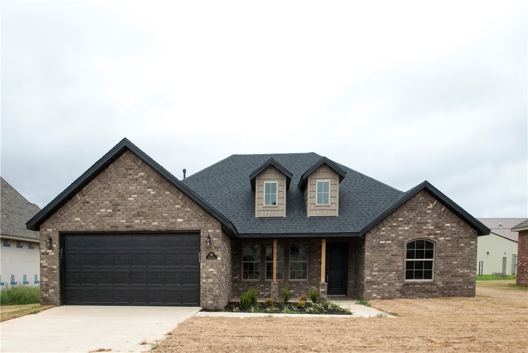 Cypress Plan.  Smart Home features. 2 sided fireplace, large kitchen with lots of cabinets and extra long eating/serving bar.  Wood accent beams in living room and dining/gathering room.  Welcoming front porch and wood look tile in living room, dining, kitchen and hall ways. Large laundry room with built in lockers. Home has 2 " faux wood blinds, full gutters and front privacy wings with one walk gate. Fully tiled shower in master and large whirlpool tub.