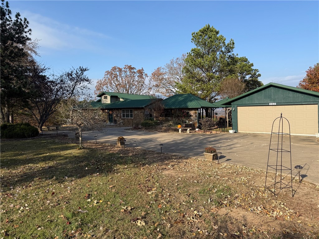 *Sellers are offering a $5,000.00 credit with an acceptable offer to use toward closing costs or to buy down your rate. Unobstructed views and endless possibilities on 8+ acres. This property is a rare find. Enjoy wide-open sightlines a beautifully landscaped garden with a tranquil koi pond, and room to truly spread out with Airbnb or short-term rental potential.  Updated open concept kitchen with newer cabinets, island and granite tops, 2 pantry's, mud room and home office. Main floor laundry room. 
Car lovers and entrepreneurs will love the 30' X 50' metal-beam shop ideal for an at home business, workshop, studio, or secure storage for multiple vehicles and toys w/8''concrete floor and a 15X50 lean to and full bathroom, extra tall drive through garage doors on each end. Building also has its own meter w/200amp svs. Agent owned. If you’re dreaming of a peaceful homestead, a weekend getaway destination, or a place to grow your business from home, this property offers the flexibility to make it happen.