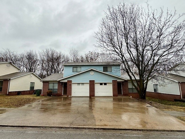 Great rental opportunity in this 2 bed 2 bath 1 car garage Duplex in excellent Fayetteville location. Located just off I-49, across the street from Fayetteville's Centennial Park at Millsap Mountain and less than 2 miles from U of A!  Comes with all appliances including washer and dryer. Lawn care included, fenced in back yard and more. **Pics may not be of exact unit**