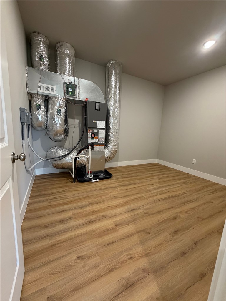 Highpointe!!! Beautiful New Construction Townhome in Pea Ridge!!! 3 bedrooms 2 1/2 baths, Master on main level. Wood style flooring throughout. Kitchen features custom cabinets, stainless appliances, granite counters, large pantry. Living room has high ceiling and is open to the kitchen and access to the back covered patio. Master bedroom includes walk in shower double sinks and large closet. Upstairs has 2 large bedrooms and 1 full bath, bonus room/office and additional storage room, garage is insulated and included an insulated garage door. Lawncare is included.
