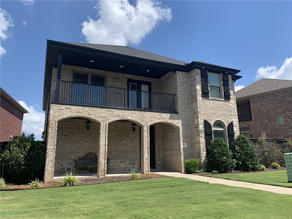 Beautiful 5-bedroom, 2.5-bath home conveniently located within walking distance to shopping, dining, and everyday amenities, and just minutes from the University of Arkansas. The community pool is right across the street for easy access and summer fun. The main level includes everything needed for everyday living, while upstairs offers additional bedrooms, a full bath, and a spacious balcony that's perfect for relaxing or entertaining guests.**$250 non-refundable pet fee per pet-Fireplace is decorative only.**