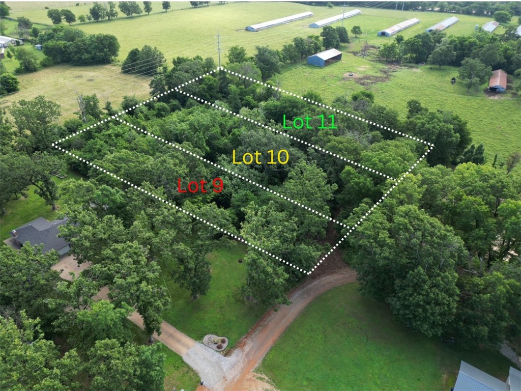Discover the perfect place to build your dream home on this .75-acre lot located within the city limits of Gentry. Tucked away in a peaceful setting, this property offers a secluded feel while remaining conveniently close to Highway 59 for an easy commute and quick access to local amenities. Water is available at the street, and a septic system will be needed. Whether you're looking to build now or invest for the future, this property offers a great combination of privacy, convenience, and small-town charm.