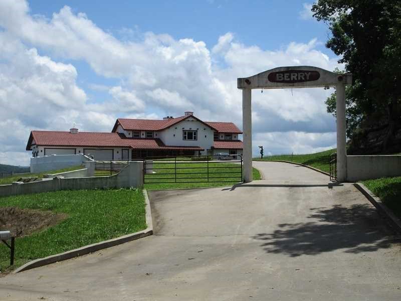 Must see!! Huge reduction...beautiful horse/cattle farm! Southwestern style home with 5,932 sq ft. plus 2,933 sq.ft. basement. 4 bedrooms, 4 bathrooms, 4 car garage, upstairs has a small kitchen, dining, and living area, large office and craft room. Fireplace, large windows in family room, radiant floor heat on main floor, and so much more. Gorgeous views from your covered porches, horse barn, RV shed.
