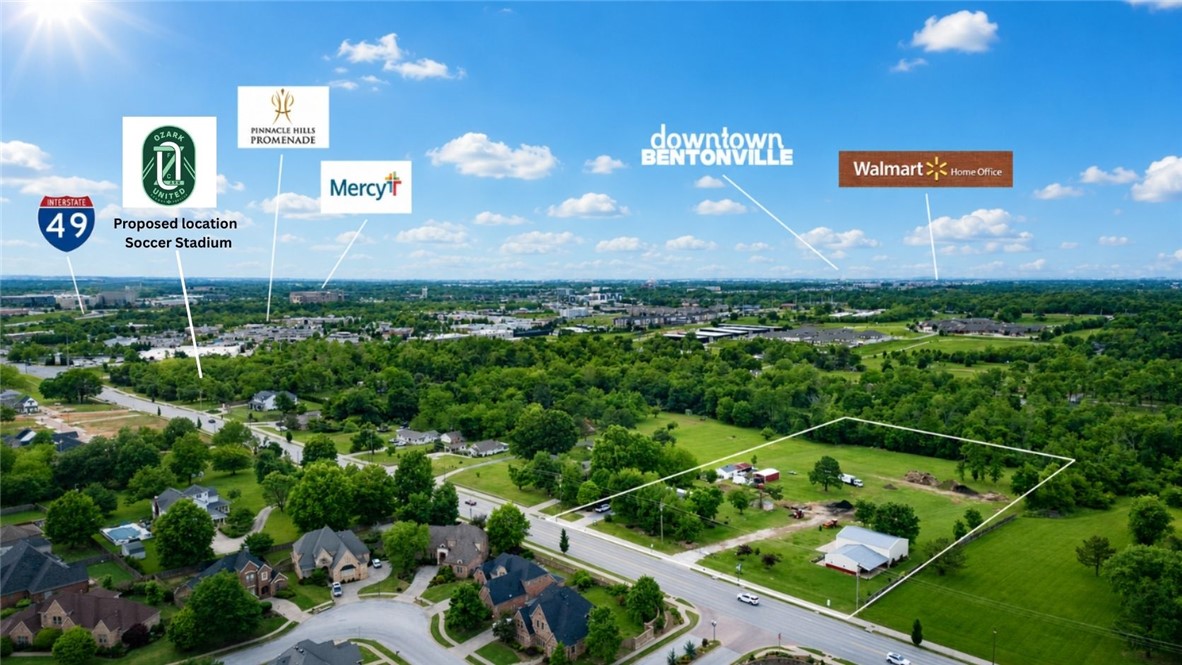 Exceptional opportunity with approximately 5(+/-) acres offering strong development potential in one of the area’s fastest-growing corridors, located less than 1 minute from the proposed Ozark United Soccer Stadium. Currently zoned T2: Agricultural, the property presents opportunities for future rezoning and redevelopment and sits just 2 minutes from Pinnacle Hills Promenade, less than 5 minutes to I-49 which sees approx +120,000 VPD, and near major attractions including the Walmart AMP. The site features a 3,000(+/-) SF warehouse with approximately 2,000 SF of garage space with two drive-in doors and about 1,000 SF of finished living space, along with an additional 1,885(+/-) SF home. Infrastructure includes separate septic systems for both structures, public water servicing the property, well water available for landscaping, sewer access approximately 185 ft to the east, and 335 feet of road frontage along Perry Rd, making this an exceptional opportunity for developers and investors in a rapidly growing area.