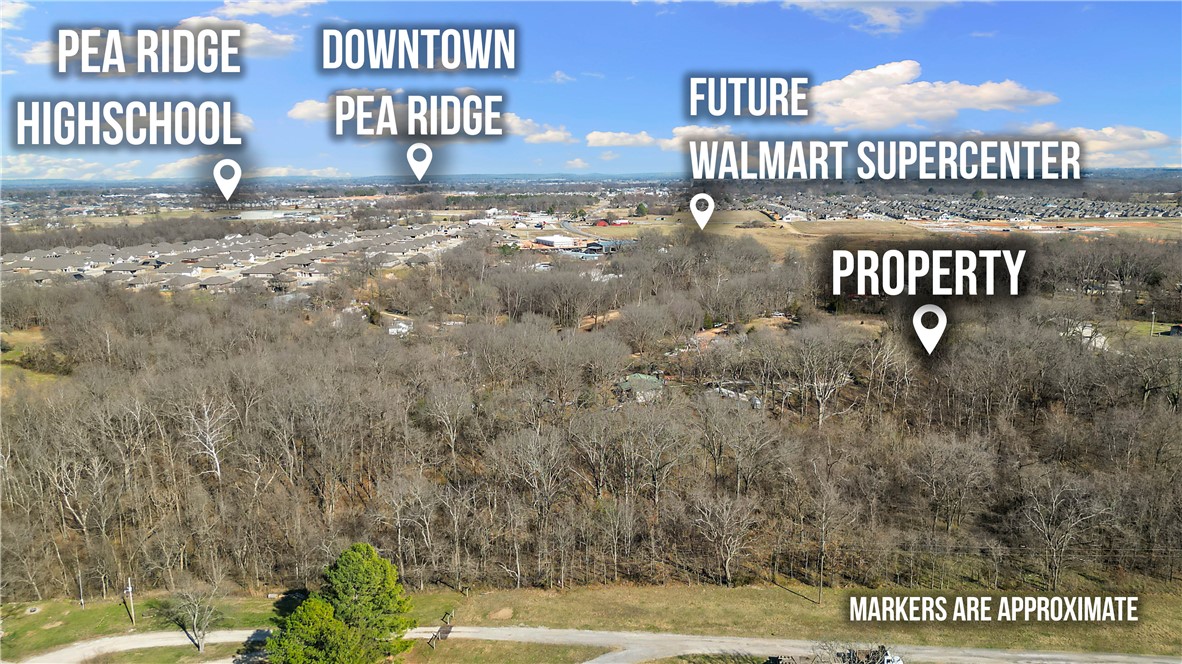 At the end of the gravel road, Johnson Hollow Road sits on +/- 3 acres ready for your family — or your
next development opportunity. Perfectly positioned near the Pea Ridge/Bentonville line, this location is
close to everything we love in NWA. Pea Ridge continues to grow, highlighted by the announcement of a
new Walmart Supercenter just across Hwy 72 from the property, a nearby disc golf course, and ongoing
residential and commercial development. With continued growth in the area, this property presents potential for stunning
homes on spacious lots or a place for your family to build your dream home.