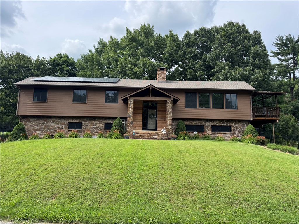 Beautiful home on 2 Acres in the Heart of Town – Near Lake Fayetteville. Rare opportunity to own a private 2-acre property in a prime in-town located just minutes from Lake Fayetteville, the Greenway, and scenic walking/biking trails. This home offers a functional layout with room to spread out, including a large bonus room downstairs. Updates throughout: granite countertops, mix of wood, tile, and newer carpet. Spacious master suite with a large bathroom, walk-in shower, and soaking tub. Major upgrades provide peace of mind: new roof, windows, front LP smart siding (2026). This home also features solar panels, 220V plug ready for electric vehicle charging, city water for the house, but also has private well with two yard spigots, a shop: 1,600 sq ft enclosed + 1,200 sq ft of lean-to space, outdoor covered storage area. Fun, family-friendly backyard featuring a treehouse, zip line, and outdoor ping pong area. This property truly has it all—space, location, updates, and unique features you won’t find anywhere else.