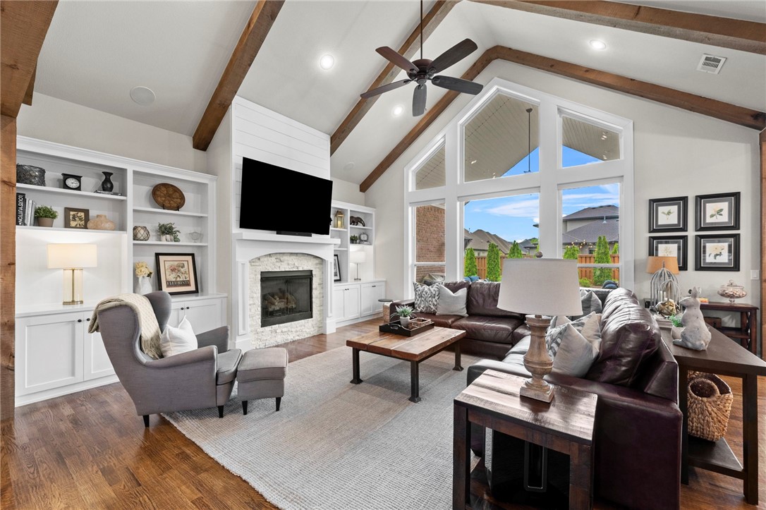 Built by Tall Oaks Construction, one of Scissortail’s most respected builders, this custom 3,632sqft 4 bed, 4 bath home with a 3 car garage has premium finishes, thoughtful functionality & storage galore.  Stepping into you're new home you'll be invited by floor-to-ceiling windows that flood the main living area with natural light that provide views of the professionally landscaped backyard, complete with an extended patio & built-in firepit.  The kitchen is a dream for any host featuring Cambria quartz countertops, gas cooktop, soft-close cabinetry, & a massive island for gathering. The primary suite offers dual vanities with a floating tub, tiled walk-in shower, & a bright, spacious closet. Enjoy custom shutters throughout, motorized blinds in the living room, plus a dedicated office & bonus room that can serve as a fifth bedroom.  Scissortail’s amenities include a clubhouse, adult & family pools, gym, sports court, firepit, & playground. *Preferred lender offering 1% of purchase price toward closings costs.
