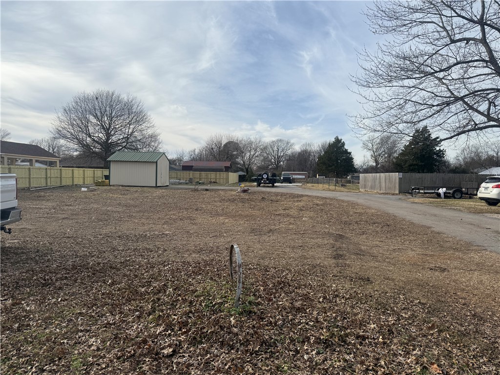 Ideal location for duplexes or three to four family residental townhouses.  Currently under city approval for MF-4 zoning classification.  0.52 +/- acres with room to build 4 townhouses. Property close to all NW Arkansas has to offer, including biking and Razorback Greenway Trail.  Don't miss this opportunity for multi-family space to make your own, great location, property is ready to go.