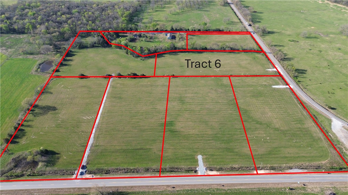 Tract 6 is located off of HWY 43 in western Benton County.  Upon finalization of the survey/plat, Tract 6 will be 6.13 m/l acres.  Located off of paved road with electric and rural water at the street, this tract provides an excellent opportunity to live in the country but have convienent access to Gravette, Decatur, Siloam Springs and the rest of NWA.