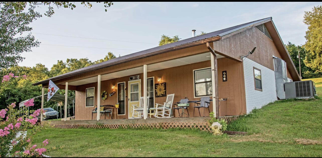 Hill Song Cottage plus a studio cabin are located 2/10 of a mile off highway 21 in the historic community of Kingston which is on a popular travel route to the Buffalo National River and variety of outdoor adventures.  Half mile from the Kingston square, Fast WIFI, nearby gas stations and food places. These are currently used for nightly rentals and being sold fully furnished. The main cottage is 3 bed, 2 bath. that will sleep 8. Studio cabin is 1 bed 1 bath and sleeps 2. It has a mini split for heat and air.  Plenty of parking, even for trailers and an RV.  Room for additional small cabins for expansion.REF MLS# 144988The well has an ultraviolet system that kills bacteria - Map included because GPs does not get you there