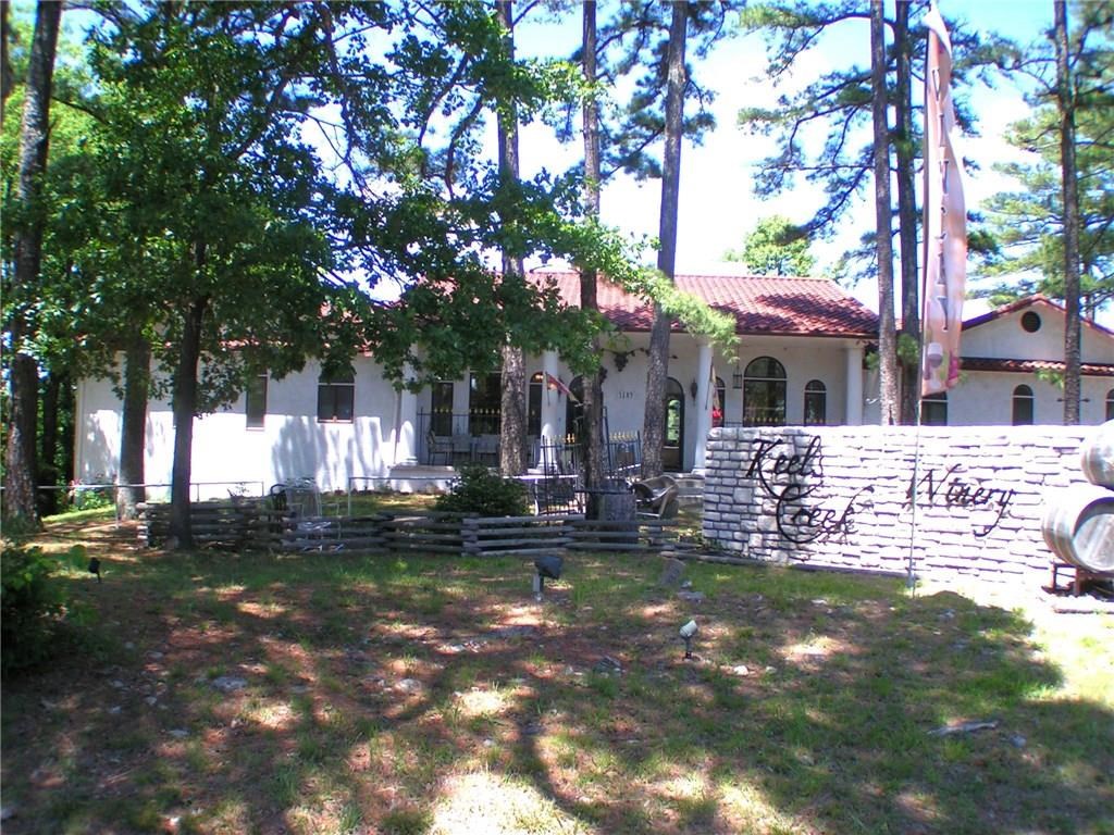 Large, inviting commercial building with highway frontage. Property offers appealing interior space with large rooms, adaptable layout and existing kitchens. Large basement is finished, climate controlled and accessible by elevator or stairs. The landscaped outdoor areas allow room for gathering or relaxing. This location would be ideal for event space, retail, restaurant, brewery. What's your vision?