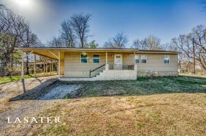 Located in Valley Spring is this 3 bedroom, 1 bath home on 1.2 acres featuring hardwood floors and updated tile, a large living room, with a gas fireplace and dining room, galley kitchen with electric range and dishwasher, and a large laundry room. Private setting off the highway with a large front and back yard, detached storage room and a 1 car carport. This home is move in ready and perfect for the first time home buyer.