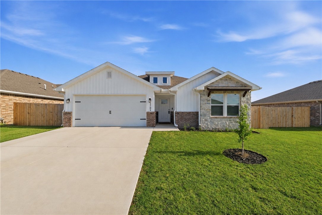 Ask about 1% rebate with preferred lender!!!! This beautifully designed, 1 level- home features a open-concept layout & desirable split floor plan.  Designed with seamless entertaining in mind, the heart of the home is the oversized kitchen featuring a stunning waterfall kitchen island, black stainless-steel appliances, walk-in pantry, and dedicated coffee bar area that flows effortlessly into the expansive living and dining spaces. This 4-bedroom, 2-bathroom home offers generously sized bedrooms and a thoughtfully designed layout ideal for families. The secondary bathroom has been upgraded with a dual vanity for added convenience and style. Additional upgrades include a full privacy fence, premium insulated garage door, and wired surround sound, creating the perfect atmosphere for entertaining indoors and outdoors. Located in a highly desirable area, this move-in ready home combines modern finishes, energy-efficient upgrades, and functional living spaces.